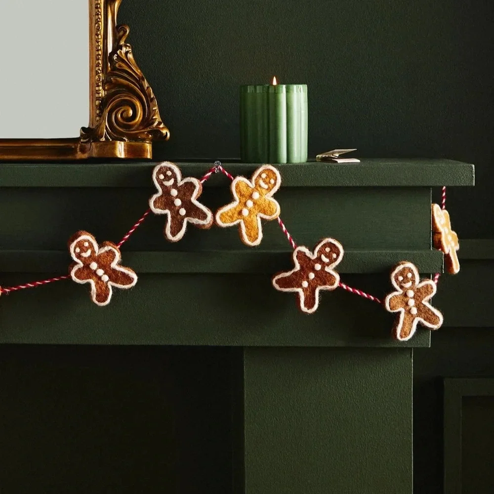 Anthropologie gingerbread men christmas garland wool decor holidays neutral home